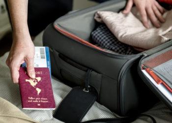 A man preparing to travel